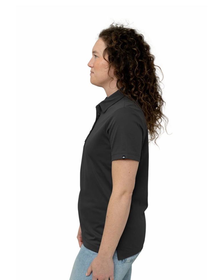 Image of a model wearing a TM1WW001 TravisMathew Ladies Oceanside Solid Polo