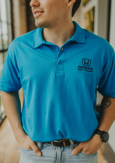 Customer wearing a 8800 Gildan 5.6 oz. DryBlend 50/50 Jersey Polo