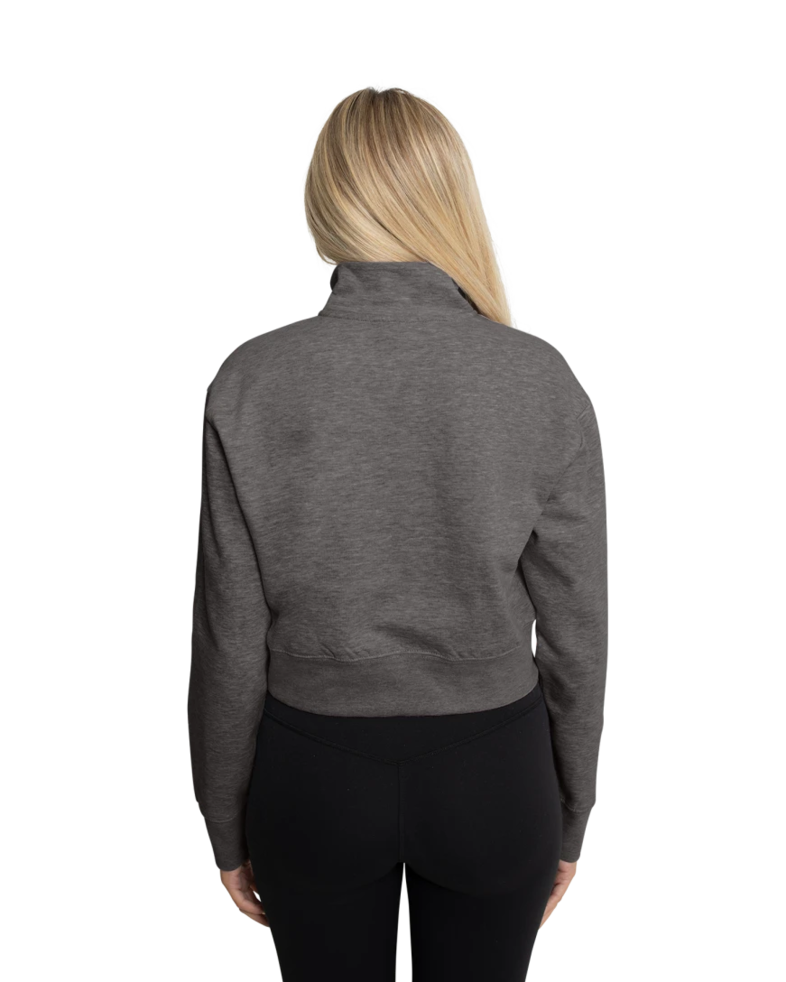 Image of a model wearing a DT6111 District® Women’s V.I.T.™ Fleece 1/2-Zip