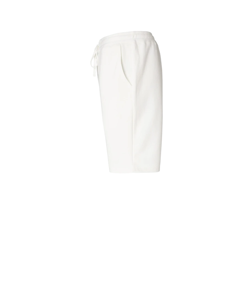 Image of a model wearing a PRM50STPD Independent Trading Co. Pigment-Dyed Fleece Shorts