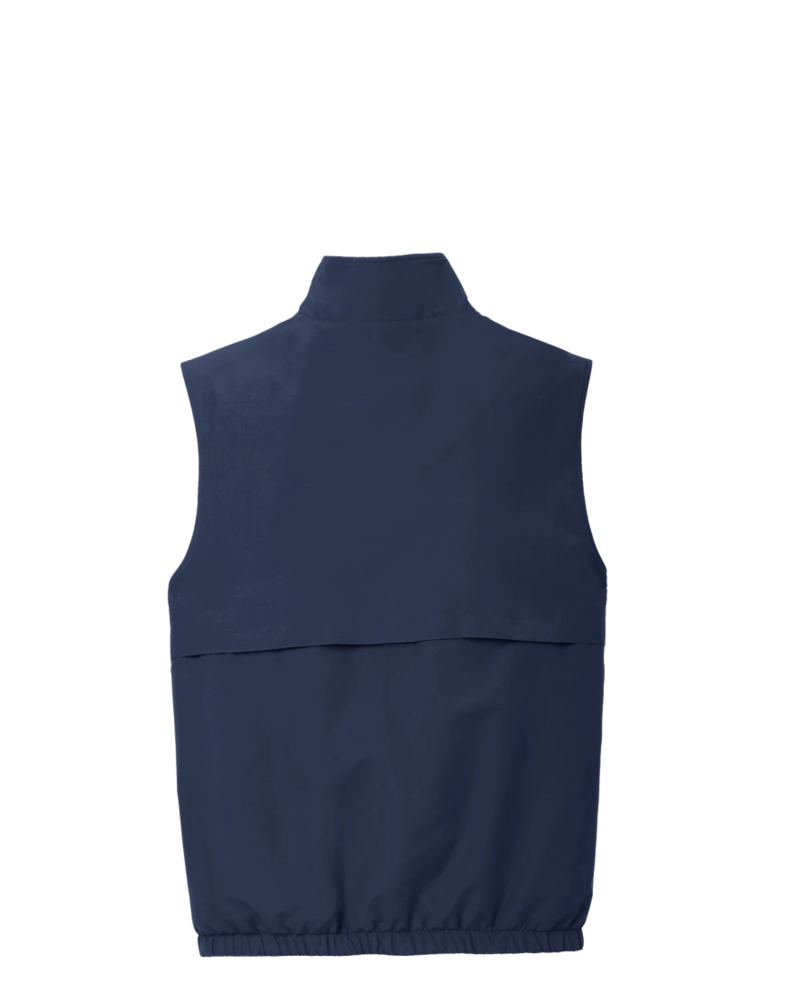 Image of a model wearing a J7490 Port Authority Reversible Charger Vest